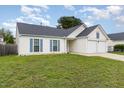Lovely single-Gathering home features a two-car garage and a grassy front lawn at 503 Kinship Ln, Apex, NC 27502
