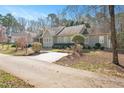 Lovely one-story home with a long driveway and well-maintained landscaping at 2412 Mollynick Lane Ln, Wake Forest, NC 27587
