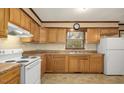 Functional kitchen featuring ample cabinet space, laminate countertops, and modern appliances at 713 Marlboro Pl, Rocky Mount, NC 27801