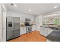 Bright, updated kitchen featuring stainless steel appliances and an open layout at 313 Glen Echo Ln # J, Cary, NC 27518