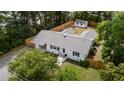 Aerial view of a charming home with a fenced backyard and a detached storage shed at 314 Wrenn St, Apex, NC 27502