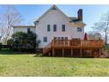 Spacious backyard with a wooden deck, perfect for outdoor entertaining at 511 Windstream Way, Cary, NC 27518