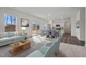 Bright living room with open floor plan, dining area and access to kitchen at 935 Bombardier Ln, Spring Hope, NC 27882