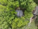 Aerial view of a home with mature trees surrounding the property at 103 Oxford Cir, Knightdale, NC 27545