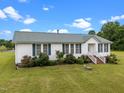 Attractive single-story home with a well-kept front yard and a clean, classic exterior at 1993 Lucy Garrett Rd, Roxboro, NC 27574