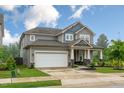 Beautiful two-story home with a well-maintained lawn and two-car garage at 304 Avery Glenn Way, Fuquay Varina, NC 27526