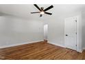 Cozy bedroom features hardwood floors, ceiling fan and plenty of closet space at 833 Brigham Rd, Raleigh, NC 27610