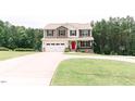 Beautiful home with a two-car garage, a front porch, and a driveway at 123 Scheer Ave, Durham, NC 27703