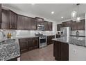 Spacious kitchen features stainless steel appliances and granite countertops at 137 Campaign Dr, Mebane, NC 27302