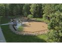 Community dog park with separate fenced areas for large and small dogs, offering a safe space for recreation at 259 Meadowbark Bnd # 32, Garner, NC 27529
