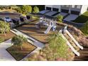 Community playground including slides and play equipment in an attractive setting at 359 Chesapeake Cmns St # 113, Garner, NC 27529
