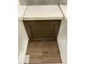 Interior design showcases brown cabinets, white countertops, and luxury vinyl flooring at 363 Chesapeake Cmns St # 114, Garner, NC 27529