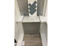 Selection of design materials with gray cabinets, white quartz countertop, and blue herringbone backsplash at 367 Chesapeake Cmns St # 115, Garner, NC 27529
