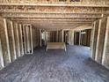 Unfinished spacious area displaying exposed framework, providing a clear view of the home's structure at 433 Old Fashioned Way Way, Lillington, NC 27546
