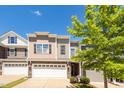 This new townhome showcases stone accents, a 2-car garage, and beautiful landscaping at 512 Barneswyck Dr, Fuquay Varina, NC 27526