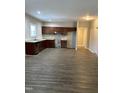 A kitchen featuring lots of floor space and stylish brown cabinets at 701 Linwood Ave Ave, Durham, NC 27701