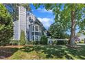 Beautiful house with a landscaped yard, large bay window, and a classic chimney at 7601 Wellesley N Park, Raleigh, NC 27615