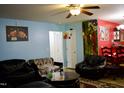 Cozy living room with comfortable seating and bright-colored walls at 764 Grove Creek Ln, Raleigh, NC 27610