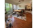 Cozy dining area with large windows, and a ceiling fan at 1708 Quail Ridge Rd, Raleigh, NC 27609