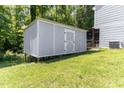 Durable utility shed with a clean design, offering practical storage for tools and outdoor equipment at 194 Catskill Ct, Burlington, NC 27217