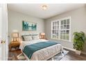 Comfortable bedroom with neutral tones, complemented by a queen bed and relaxing décor at 5008 Dantonville Ct, Knightdale, NC 27545