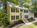 An inviting two-story home with a classic design and manicured landscaping at 2840 Mattlyn Ct, Raleigh, NC 27613