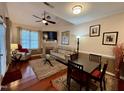 Inviting living room boasts hardwood floors, a fireplace, and plenty of natural light at 364 Bayleigh Ct, Garner, NC 27529