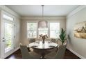 Cozy dining room features hardwood floors, neutral colors, and natural light at 5638 Wade Park Blvd, Raleigh, NC 27607