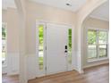 Bright entryway featuring archway, stylish flooring, and large windows at 121 River Hills Dr, Clayton, NC 27527