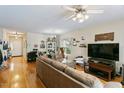 Open living space with hardwood flooring, neutral walls and plentiful natural light at 320 Madres Ln, Morrisville, NC 27560