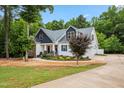 Beautiful home with manicured landscaping, a two-car garage, and a welcoming entrance at 100 Lexington Ave, Zebulon, NC 27597