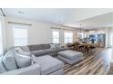 Spacious living room with a large, comfortable sectional sofa open to the kitchen at 1071 Turlington Rd, Dunn, NC 28334