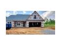 New home under construction, showing the exterior, roof and garage at 123 Maple Dr, Erwin, NC 28339