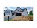 View of new home being constructed, showing facade and garage at 123 Maple Dr, Erwin, NC 28339