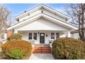 Charming home featuring a brick staircase, front shrubs, and traditional design at 507 Price Ave, Durham, NC 27701