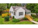 Well-maintained home showcasing a tidy yard, refreshed paint, and classic architectural details at 601 Acorn St, Burlington, NC 27215