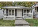 Classic single-story home with a welcoming front porch and neat landscaping, offering curb appeal and comfort at 230 Park Ave, Rocky Mount, NC 27801