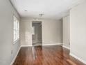 Spacious living room with hardwood floors and soft gray walls, perfect for relaxing or entertaining guests at 230 Park Ave, Rocky Mount, NC 27801