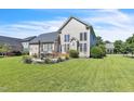 Spacious backyard with a patio area perfect for outdoor dining and entertaining at 30155 Pharr, Chapel Hill, NC 27517