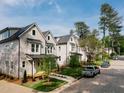 Street view of charming neighborhood homes, featuring sidewalks, manicured lawns, and tree-lined streets at 5053 Lundy Dr # 101, Raleigh, NC 27606