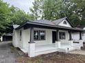 Charming single-story home with a welcoming front porch and fresh exterior paint at 722 Long Ave, Rocky Mount, NC 27801