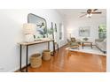 Bright and airy living room with hardwood floors, modern furnishings, and stylish decor at 925 Spring Meadow Dr, Durham, NC 27713