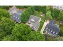 Aerial view of the property showcasing the home, manicured yard, and surrounding neighborhood at 1012 Coram Fields Rd, Wake Forest, NC 27587