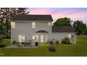 Spacious backyard with a patio, outdoor seating, and well-maintained lawn at 11233 Jeffreys Ln, Wake Forest, NC 27587
