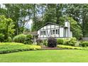 Charming two-story home with lush landscaping and manicured lawn, perfect for outdoor enjoyment at 1420 Seabrook Ave, Cary, NC 27511