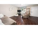 Cozy living room featuring hardwood floors, comfortable seating and natural light at 46 Sparger Springs Ln, Durham, NC 27705