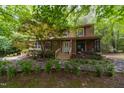 View of a beautiful two-story home with a stone walkway leading to a inviting front door at 4710 Rollingwood Dr, Durham, NC 27713