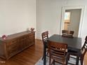Traditional dining room with hardwood floors and classic furniture at 803 W Club Blvd, Durham, NC 27701