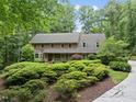 Beautiful brick home with mature landscaping, offering curb appeal and a welcoming entrance at 2300 Valley Forge Dr, Raleigh, NC 27615