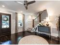 Inviting entryway featuring a staircase and natural light at 2303 Byrd St, Raleigh, NC 27608